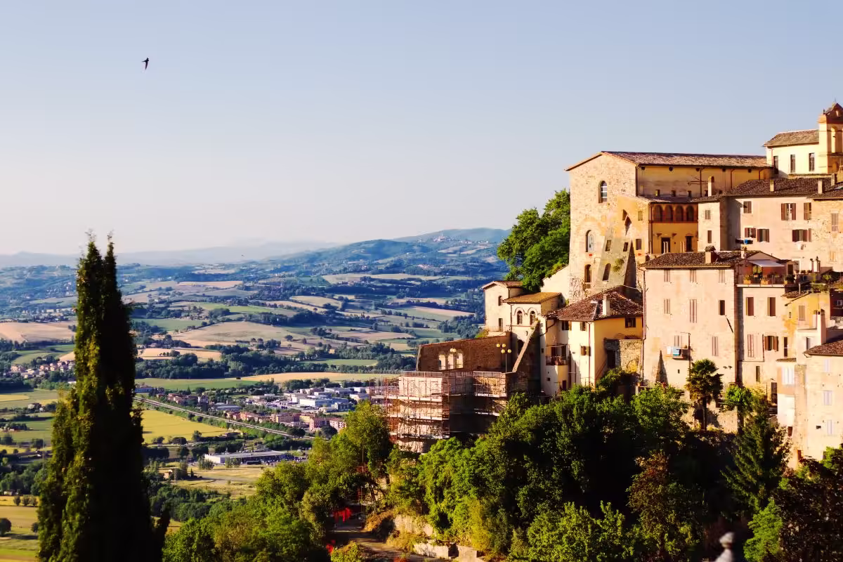 Todi, Umbria, Italy. Sunlit Medieval Todi at Dusk⁠